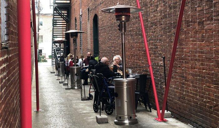 Portable propane-heaters helped to keep this downtown alleyway in Frederick, MD suitable for dining in December 2020. 