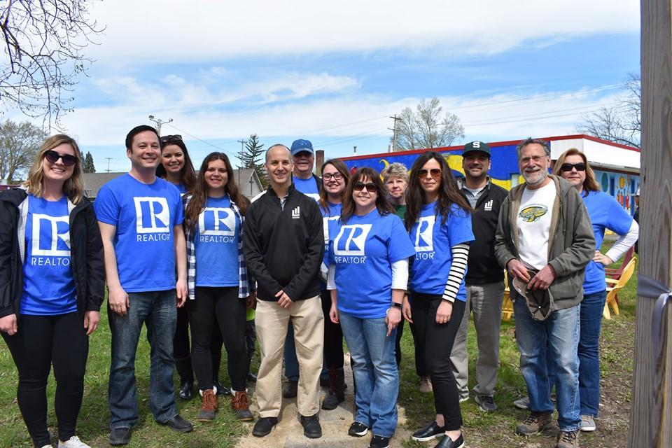 Lansing, MI, Pop-Up Park - REALTORS group photo in front of the park