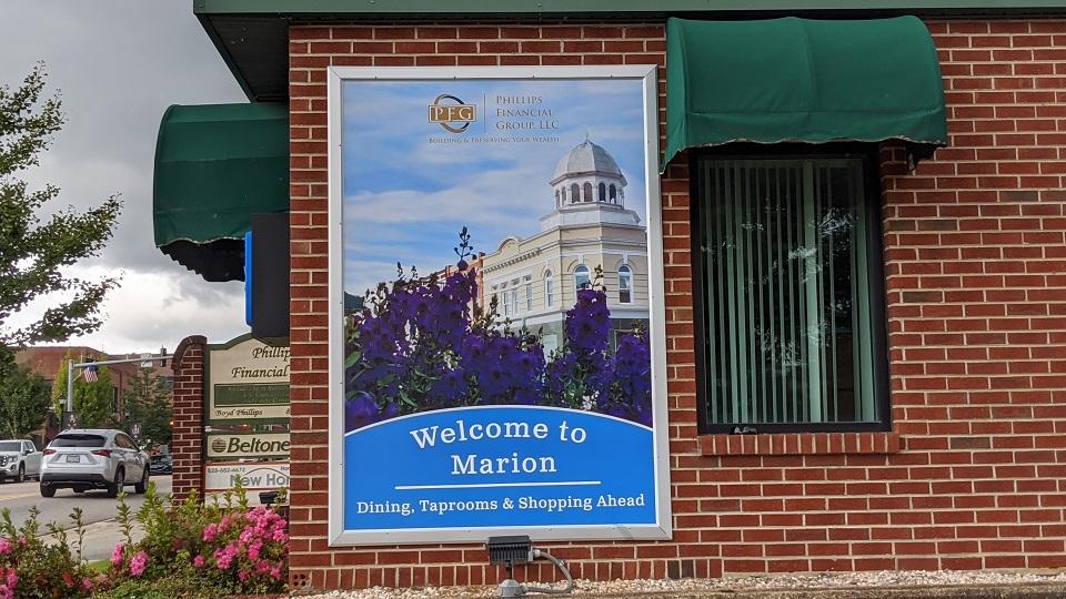 Welcome to Marion sign displayed at the Phillip Building in Marion, NC