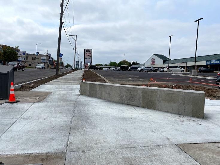 Corner parklet construction at a parking lot in the Rice and Larpenteur Corridor, MN