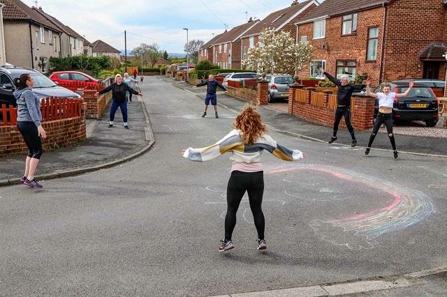 A DIY physically distanced exercise class in Little Mountain, Wales