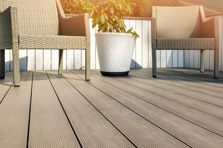 Decking with chairs and plant