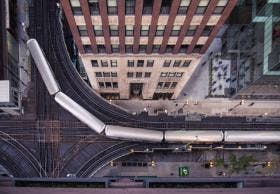 aerial image of public transit elevated train in city