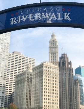 blue chicago riverwalk entrance sign