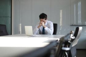 Stressed Business Man with Laptop