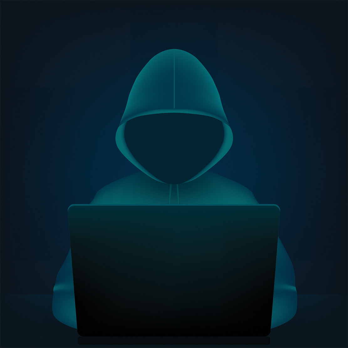 Image of hacker at computer in black and dark green image