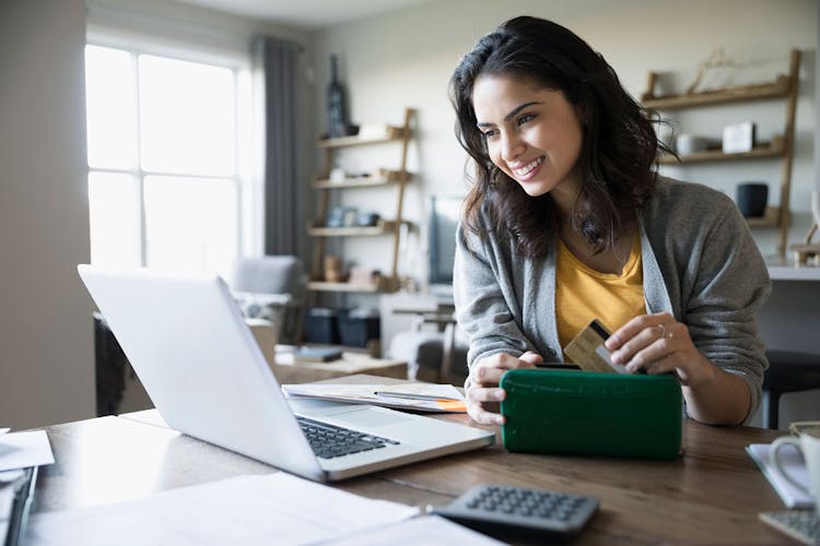 Woman at Laptop With Credit Card