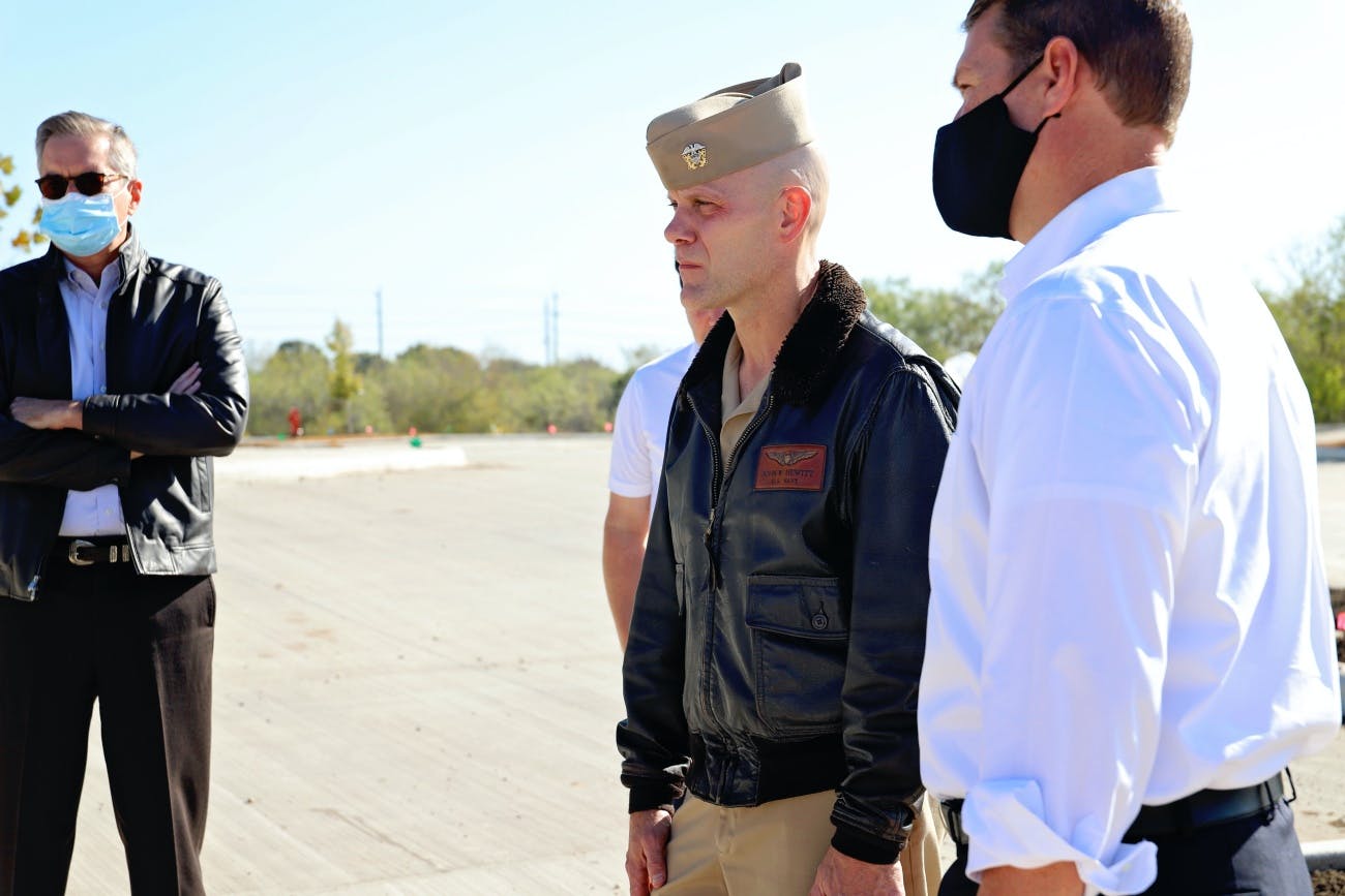 Officers and the Director of Economic Development stand at Naval Air Station Oceana in Virginia Beach