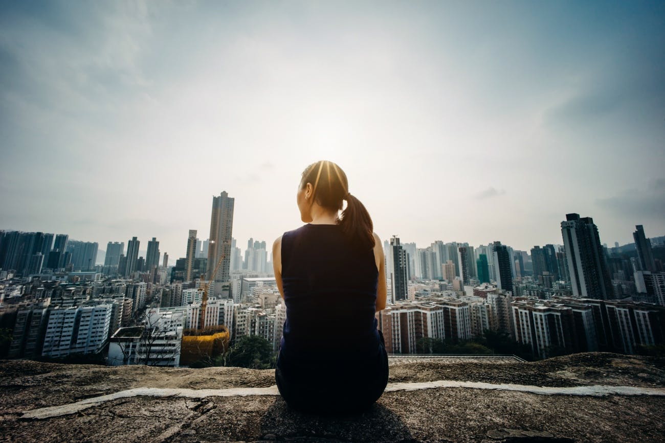 Woman gazing at city scape