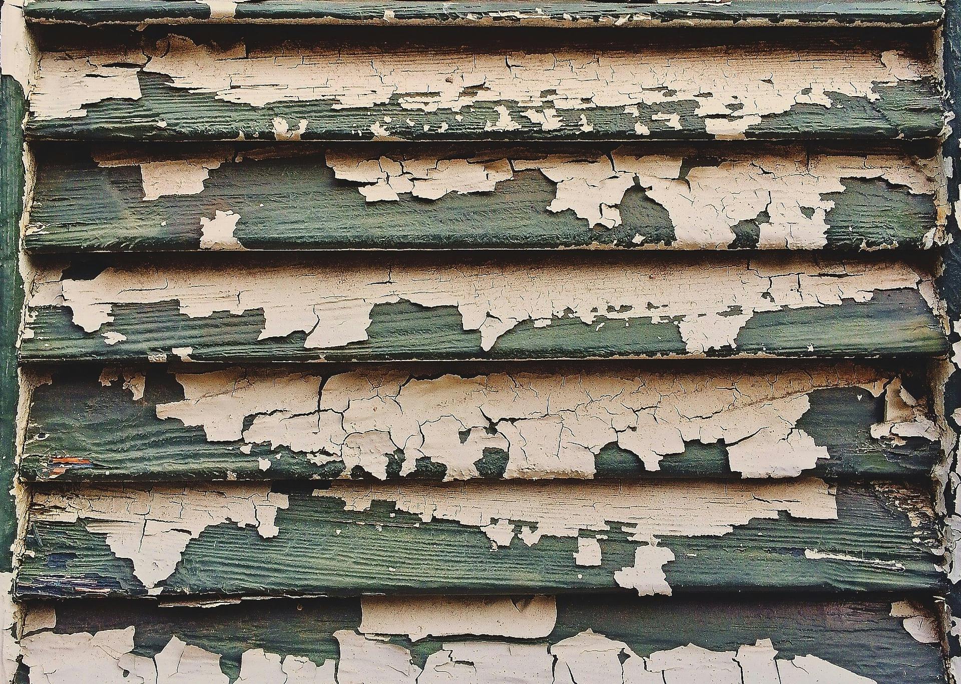 peeling paint on shutters