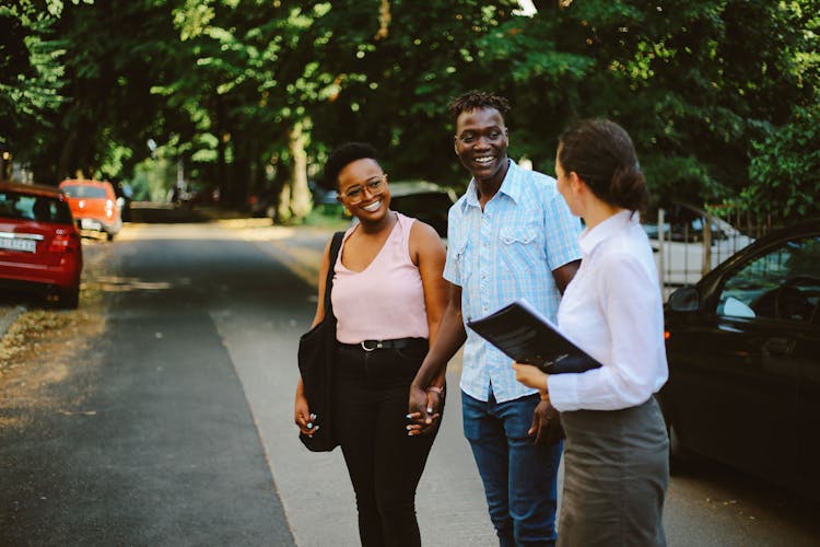 Young Black couple apartment shopping with agent