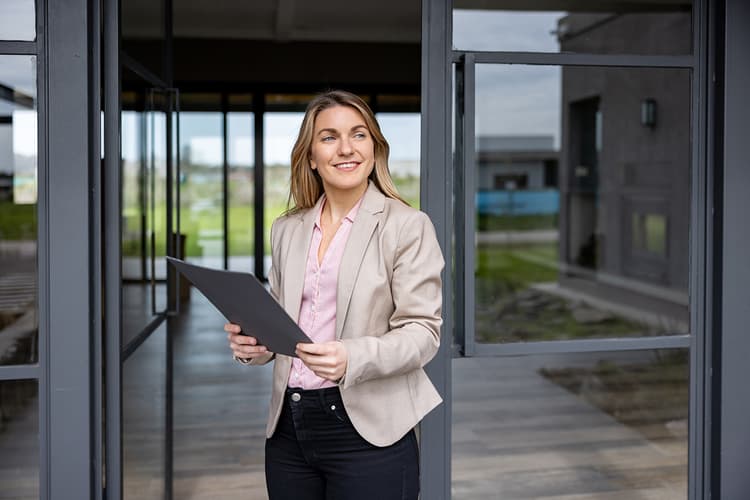 Property manager outside building Property manager outside building