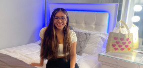 Emily in her newly updated bedroom with Make-a-Wish Foundation